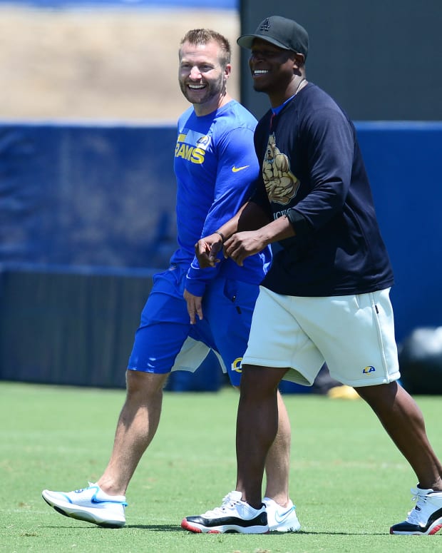 May 27, 2021; Thousand Oaks, CA, USA; Los Angeles Rams head coach Sean McVay speaks with defensive coordinator Raheem Morris during oraganized team activities. Mandatory Credit: Gary A. Vasquez-USA TODAY Sports