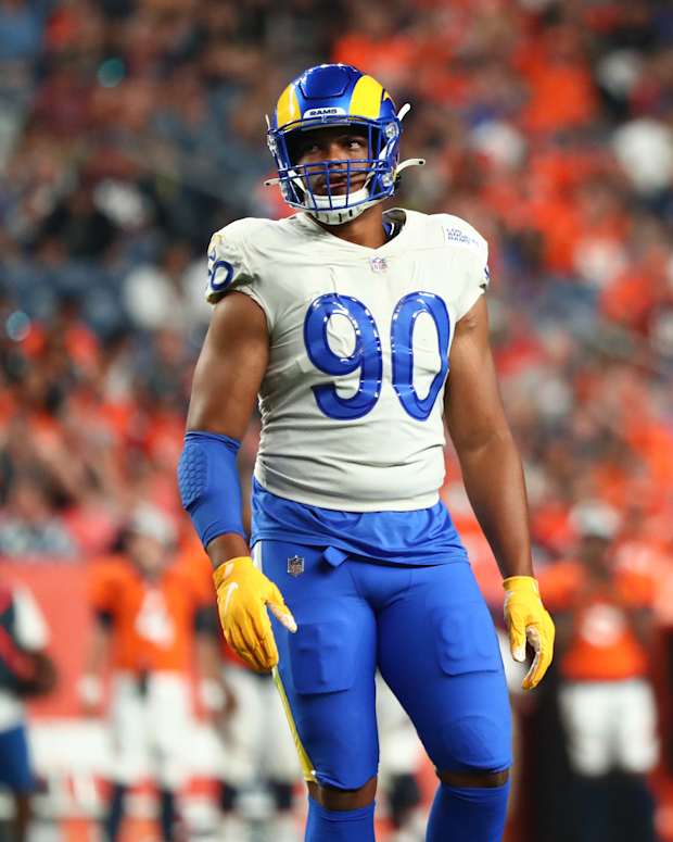Aug 28, 2021; Denver, Colorado, USA; Los Angeles Rams defensive end Earnest Brown IV (90) looks on against the Denver Broncos during the second quarter at Empower Field at Mile High. Mandatory Credit: C. Morgan Engel-USA TODAY Sports