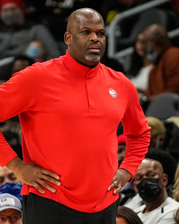 Jan 30, 2022; Atlanta, Georgia, USA; Atlanta Hawks head coach Nate McMillan follows the action against the Los Angeles Lakers during the first half at State Farm Arena.