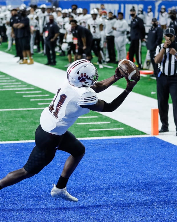 River Rouge High School wide receiver Nicholas Marsh catching a two-point conversation in the state championship (Credit: Junfu Han via Imagn Content Services, LLC_