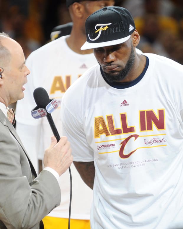 Cleveland Cavaliers forward LeBron James (23) is interviewed by TNT announcer Ernie Johnson after beating the Atlanta Hawks in game four of the Eastern Conference Finals of the NBA Playoffs at Quicken Loans Arena.