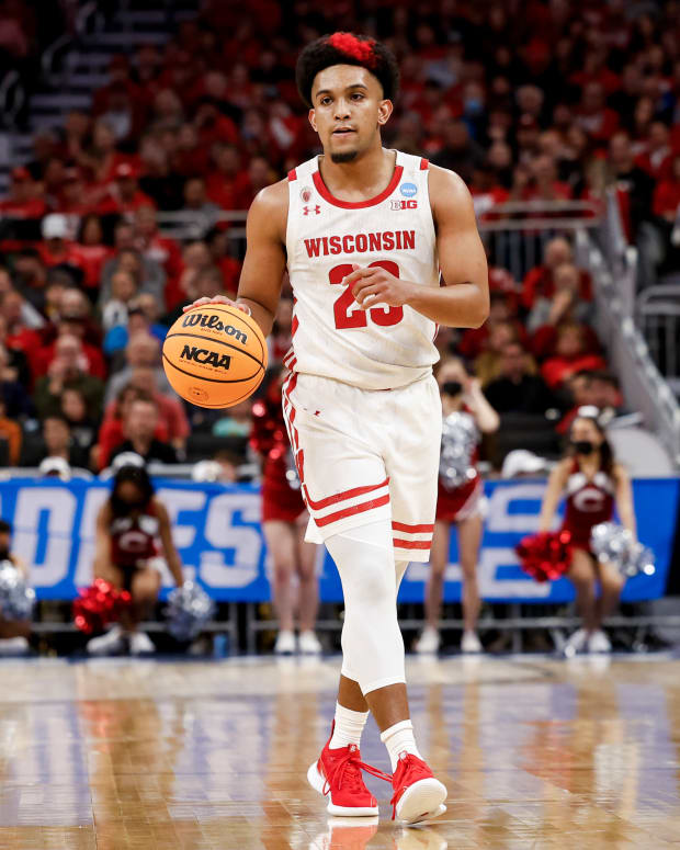 Chucky Hepburn of Wisconsin dribbles the ball up the court in the NCAA Tournament.