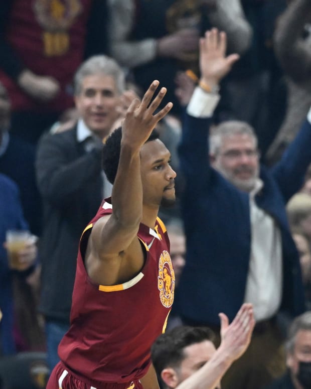 Cleveland Cavaliers center Evan Mobley (4) celebrates his three-point basket in the first quarter against the Atlanta Hawks at Rocket Mortgage FieldHouse.
