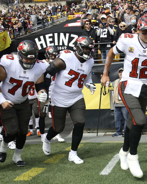 Tampa Bay Buccaneers quarterback Tom Brady (12) and his offensive line take the field against the Pittsburgh Steelers.