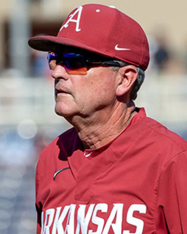 Razorbacks coach Dave Van Horn on the field before a game in the College World Series in Omaha against eventual national champion Ole Miss.