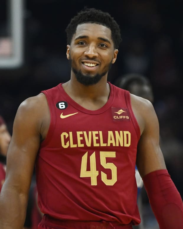 Cleveland Cavaliers guard Donovan Mitchell (45) reacts after being called for traveling during the first half against the Orlando Magic at Rocket Mortgage FieldHouse.