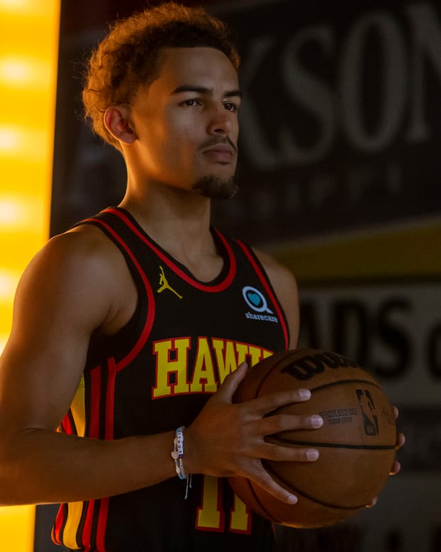 Trae Young poses for a photo.