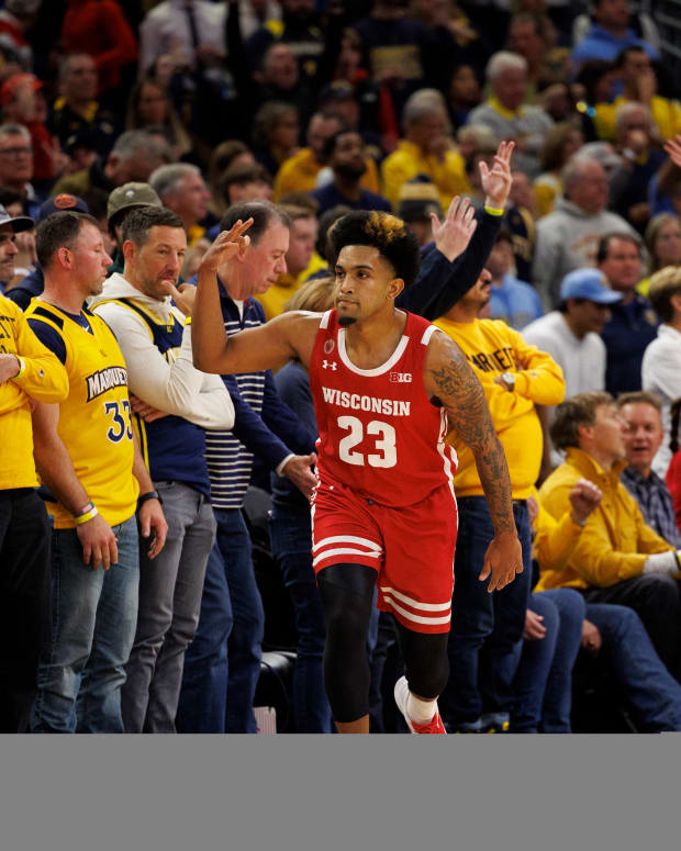 Wisconsin guard Chucky Hepburn celebrates a late three-pointer against Marquette.