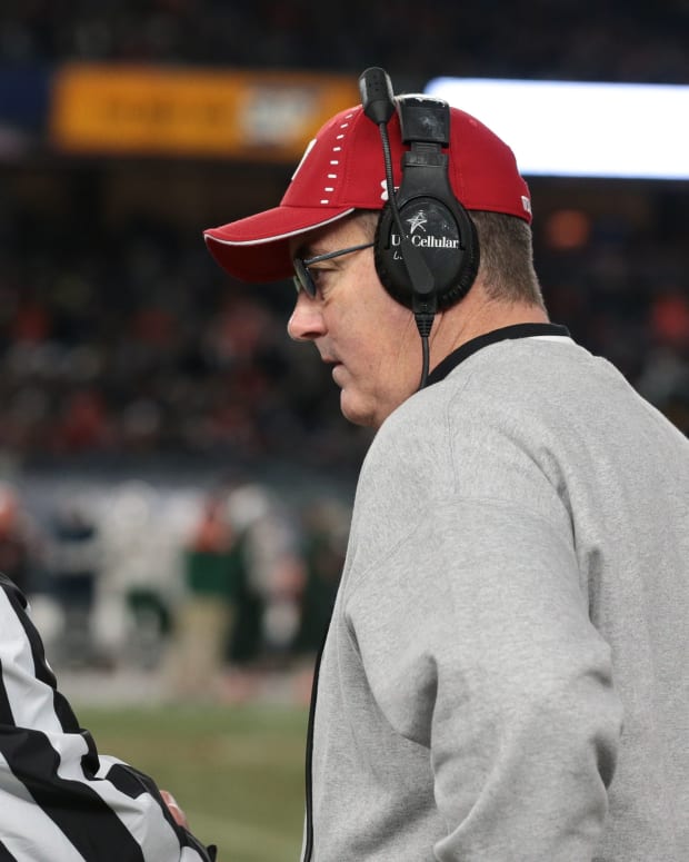 Paul Chryst speaking with a referee during the Pinstripe Bowl (Credit: Vincent Carchietta, Vincent Carchietta-USA TODAY Sports)