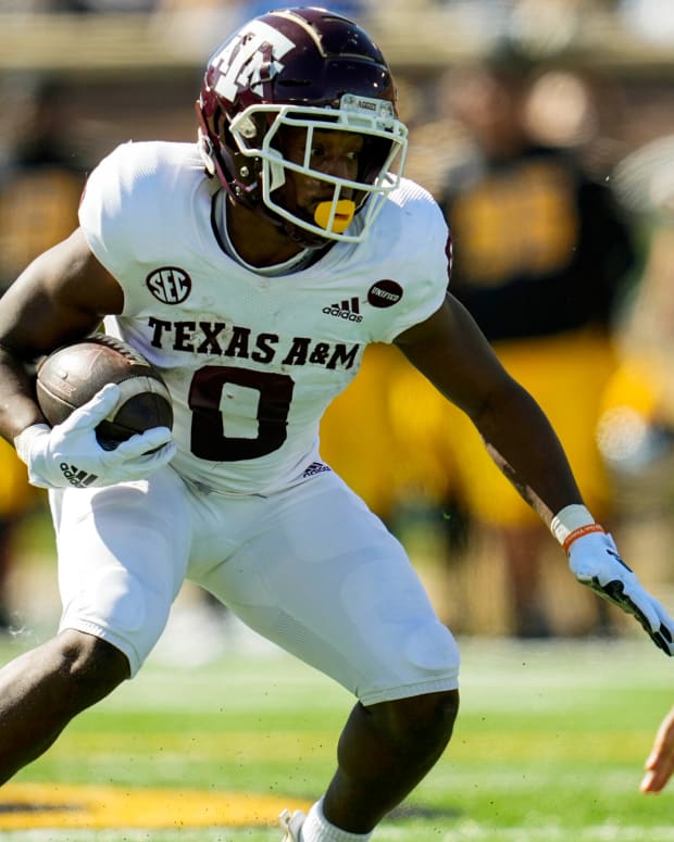 Texas A&M wide receiver Ainias Smith was arrested on weapons and marijuana charges ahead of SEC Media Days.
