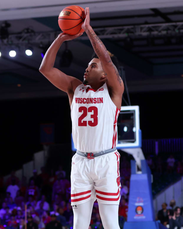 Wisconsin guard Chucky Hepburn making a three against USC in the Battle 4 Atlantis.
