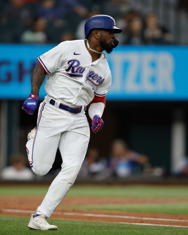 Sep 13, 2022; Arlington, Texas, USA; Texas Rangers right fielder Adolis Garcia (53) runs to second base after hitting a one-run RBI double in the first inning against the Oakland Athletics at Globe Life Field. Mandatory Credit: Tim Heitman-USA TODAY Sports