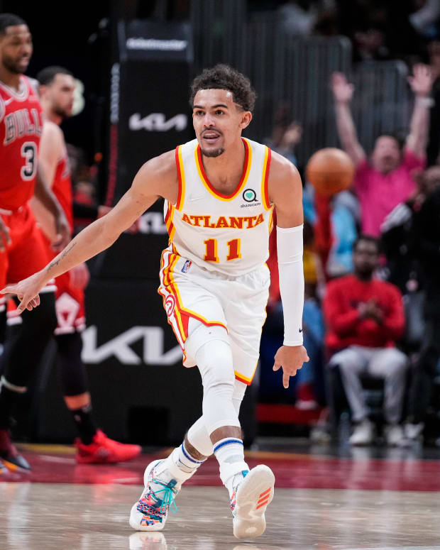 Atlanta Hawks guard Trae Young (11) reacts after making a three point shot against the Chicago Bulls during the second half at State Farm Arena.