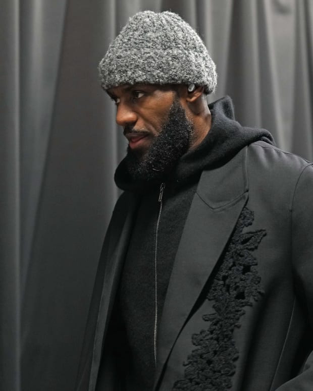 LeBron James arrives to an arena before a game.