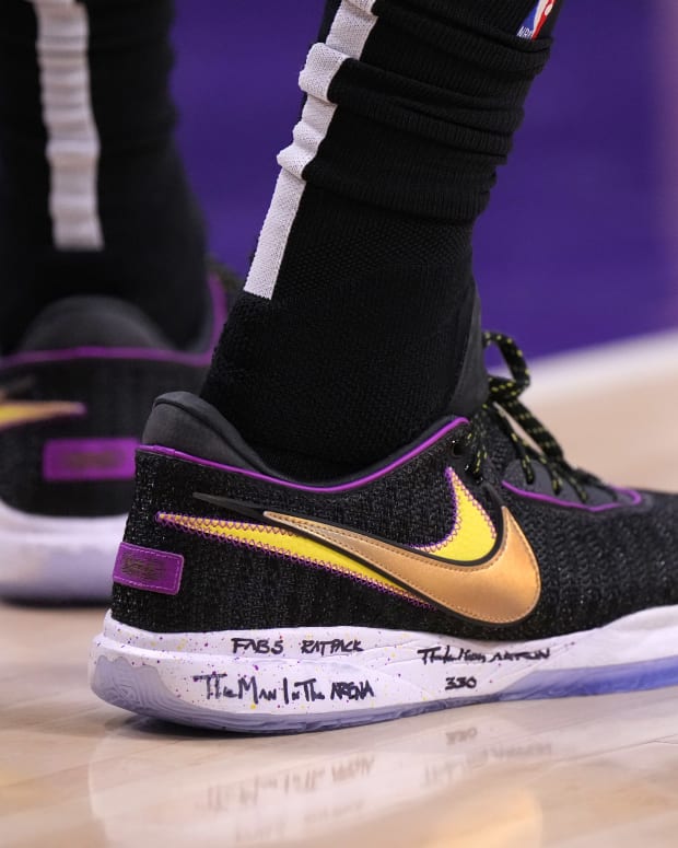 black and gold lebrons