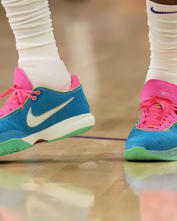 View blue and pink Nike LeBron shoes.