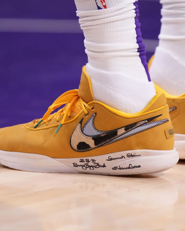 black and gold lebrons