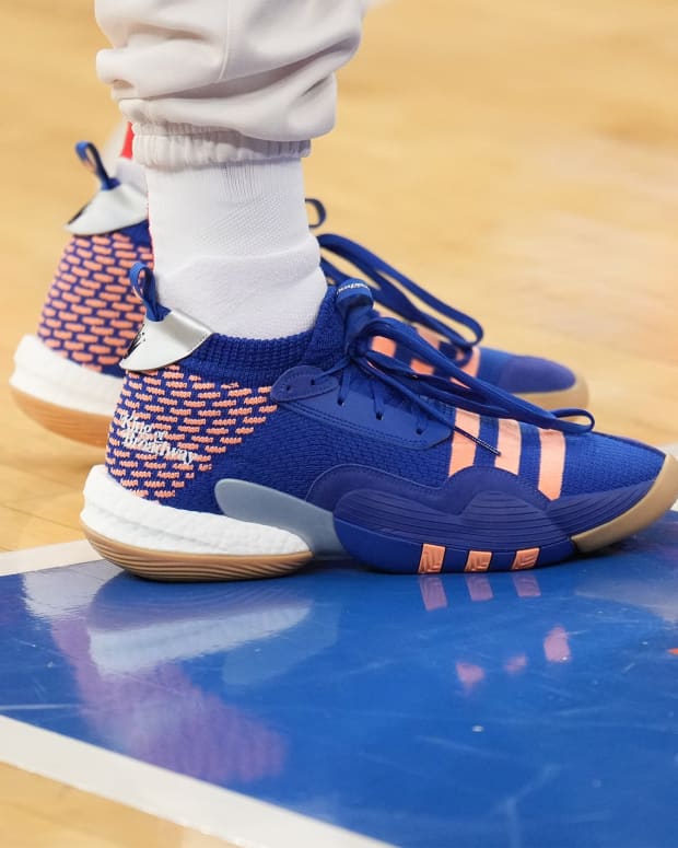 View of Trae Young's blue and orange shoes.