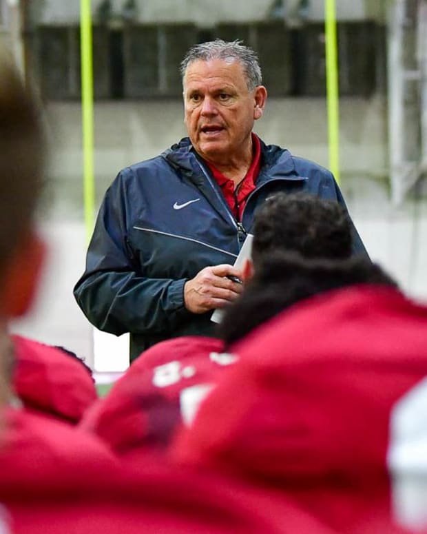 Arkansas head football coach Sam Pittman talks with his Razorback football team during spring practice. The Hogs are looking to improve on last year's 9-win season after rebuilding from the disastrous Chad Morris years.