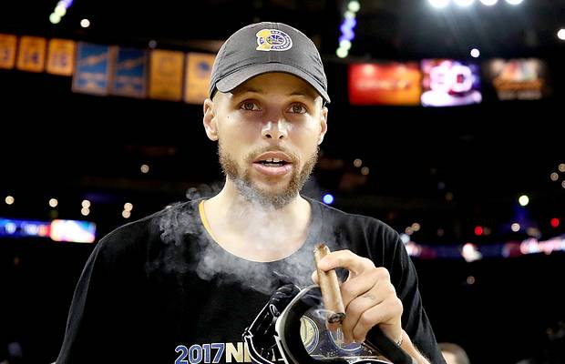 WATCH: Stephen Curry smokes victory cigar on live television after saving  it for a year