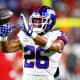 Nov 22, 2021; Tampa, Florida, USA; New York Giants running back Saquon Barkley (26) warms up prior to a game against the Tampa Bay Buccaneers at Raymond James Stadium.