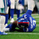 New York Giants wide receiver Sterling Shepard (3) falls clutching his left leg late in the second half at MetLife Stadium. The Giants fall to the Cowboys, 21-6, on Sunday, Dec. 19, 2021, in East Rutherford.