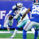 New York Giants linebacker Lorenzo Carter (59) sacks Dallas Cowboys quarterback Dak Prescott (4) for a fumble and Giants recovery in the second half at MetLife Stadium. The Giants fall to the Cowboys, 21-6, on Sunday, Dec. 19, 2021, in East Rutherford.
