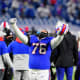 Jan 16, 2021; Orchard Park, New York, USA; Buffalo Bills offensive guard Jon Feliciano (76) celebrates their win over the Baltimore Ravens in an AFC Divisional Round playoff game at Bills Stadium. The Buffalo Bills won 17-3.