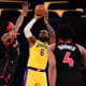 Los Angeles Lakers forward LeBron James (6) shoots against Toronto Raptors forward Precious Achiuwa (5) during the second half at Crypto.com Arena