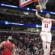 Chicago Bulls forward DeMar DeRozan (11) goes up for a dunk against the Toronto Raptors during the first quarter at United Center