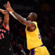 Toronto Raptors forward Thaddeus Young (21) shoots against Los Angeles Lakers forward LeBron James (6) during the first half at Crypto.com Arena