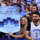 Apr 2, 2022; New Orleans, LA, USA; A North Carolina Tar Heels holds up a sign before the game against the Duke Blue Devils during the 2022 NCAA men's basketball tournament Final Four semifinals at Caesars Superdome. Bob Donnan-USA TODAY Sports