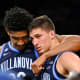 Apr 2, 2022; New Orleans, LA, USA; Villanova Wildcats forward Jermaine Samuels (left) and guard Collin Gillespie (2) reacts after their loss to the Kansas Jayhawks during the second half during the 2022 NCAA men's basketball tournament Final Four semifinals at Caesars Superdome. Bob Donnan-USA TODAY Sports