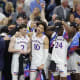 Apr 4, 2022; New Orleans, LA, USA; Kansas Jayhawks guard Christian Braun (2) and forward Jalen Wilson (10) and forward K.J. Adams (24) react after defeating the North Carolina Tar Heels during the 2022 NCAA men's basketball tournament Final Four championship game at Caesars Superdome. Stephen Lew-USA TODAY Sports