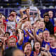 Apr 4, 2022; New Orleans, LA, USA; Kansas Jayhawks fans celebrate after their win over the North Carolina Tar Heels in the 2022 NCAA men's basketball tournament Final Four championship game at Caesars Superdome.&nbsp;Bob Donnan-USA TODAY Sports
