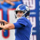 Aug 14, 2021; East Rutherford, New Jersey, USA; New York Giants quarterback Daniel Jones (8) warms up before the game between the New York Giants and the New York Jets at MetLife Stadium.