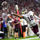 Mississippi State Bulldogs wide receiver Justin Robinson (18) cannot catch a pass in the end zone against Alabama Crimson Tide defensive back Eli Ricks (7) during the first half at Bryant-Denny Stadium.