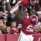 Alabama Crimson Tide running back Jahmyr Gibbs (1) celebrates with offensive lineman Tyler Booker (52) after scoring against the Mississippi State Bulldogs during the first half at Bryant-Denny Stadium.