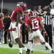 Alabama Crimson Tide defensive back Eli Ricks (7) celebrates after breaking up a pass against the Mississippi State Bulldogs during the first half at Bryant-Denny Stadium.