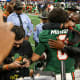 Dec 16, 2023; Atlanta, GA, USA; Florida A&amp;M Rattlers quarterback Jeremy Moussa (8) and head coach Willie Simmons celebrate after a victory against the Howard Bison in the Celebration Bowl at Mercedes-Benz Stadium.&nbsp;
