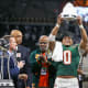 Dec 16, 2023; Atlanta, GA, USA; Florida A&amp;M Rattlers linebacker Isaiah Major (0) holds up the defensive MVP trophy after a victory against the Howard Bison in the Celebration Bowl at Mercedes-Benz Stadium.
