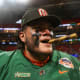 Dec 16, 2023; Atlanta, GA, USA; Florida A&amp;M Rattlers offensive lineman Cesar Reyes (77) celebrates with a cigar after a victory against the Howard Bison in the Celebration Bowl at Mercedes-Benz Stadium.