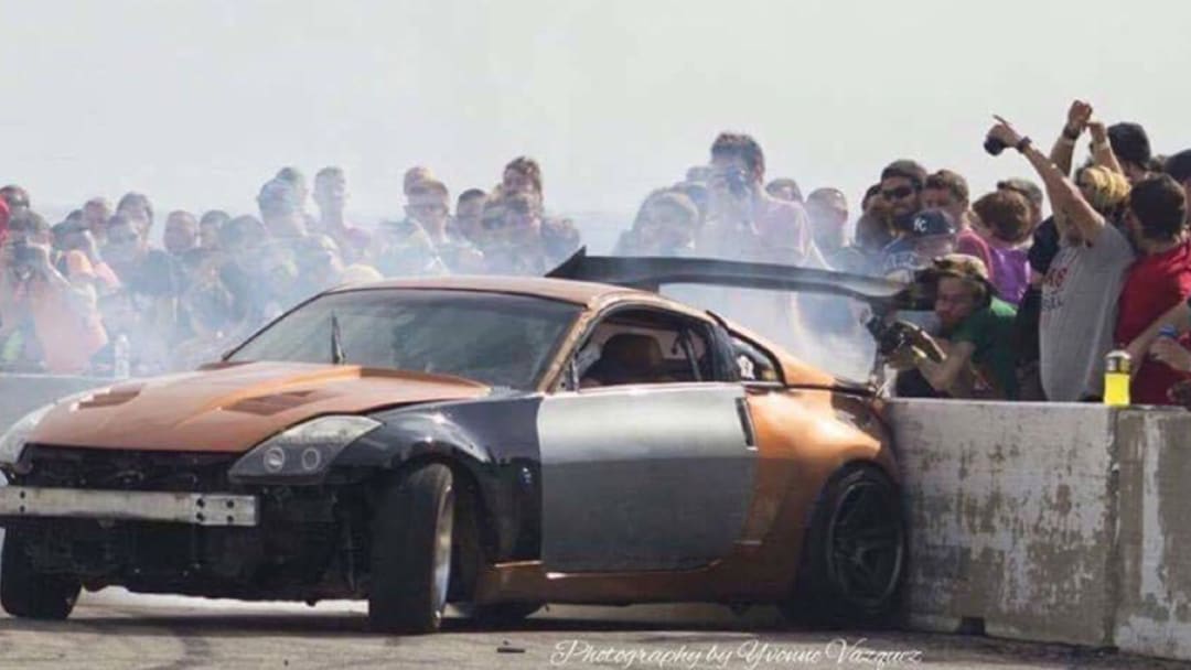 Watch: Photographer gets smacked in the face by drift car's wing