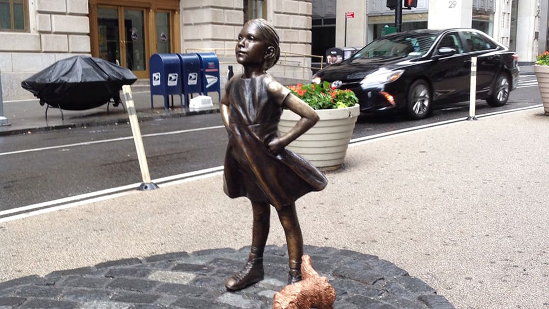 'Pissing Pug' statue installed next to 'Fearless Girl'