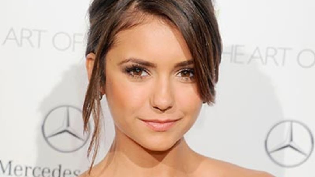 Monday's A.M. Hot Clicks: Nina Dobrev; Brett Favre in a Tree Stand