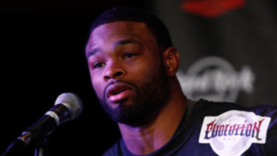 Unhaunted by Olympic dreams, Woodley guns for Strikeforce belt