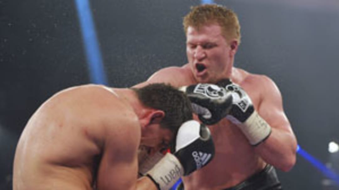 Povetkin earns decision over Huck to retain his WBA heavyweight title
