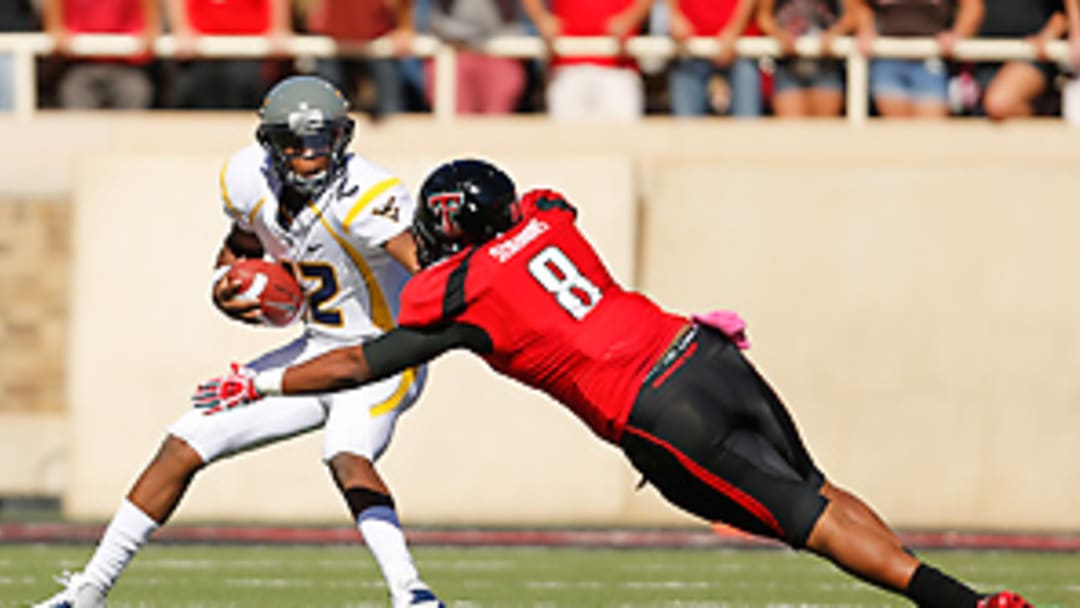 WVU's Smith holds top spot, wins Halfway Heisman despite upset