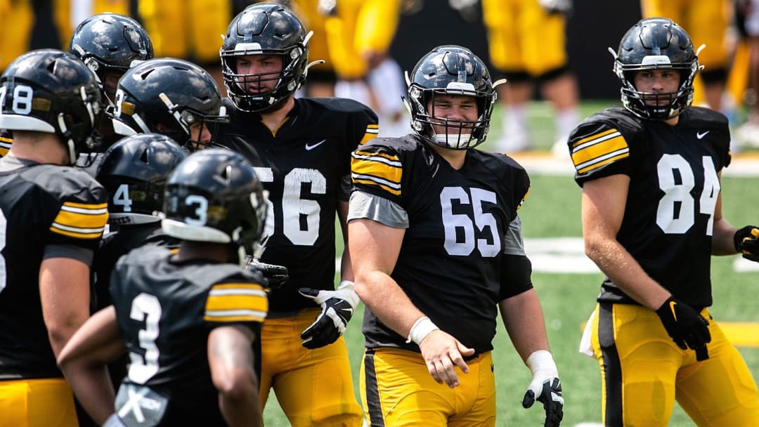 Opposing Sideline: Tyler Linderbaum Center of Attention on Iowa's Offensive Line