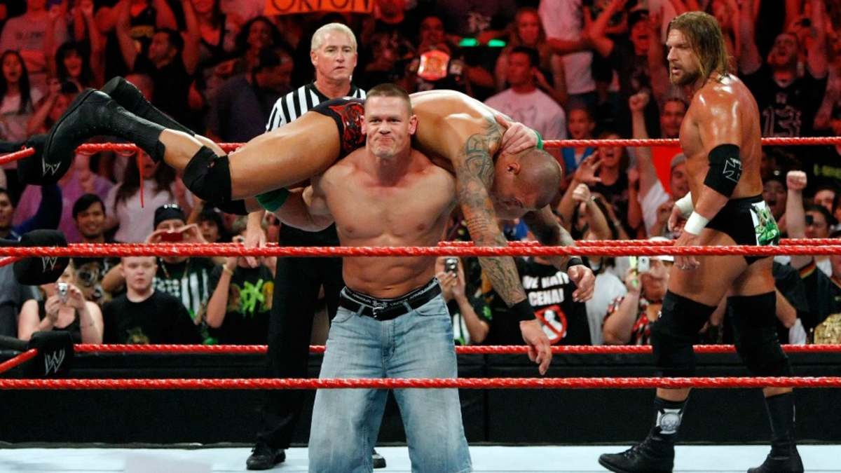 John Cena and Randy Orton sign the contract for their TLC Match: Raw, Dec.  2, 2013, image size:1200x675